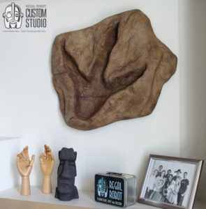 t-rex footprint wall art sculpture
