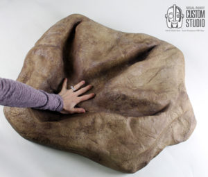 t-rex footprint wall art sculpture