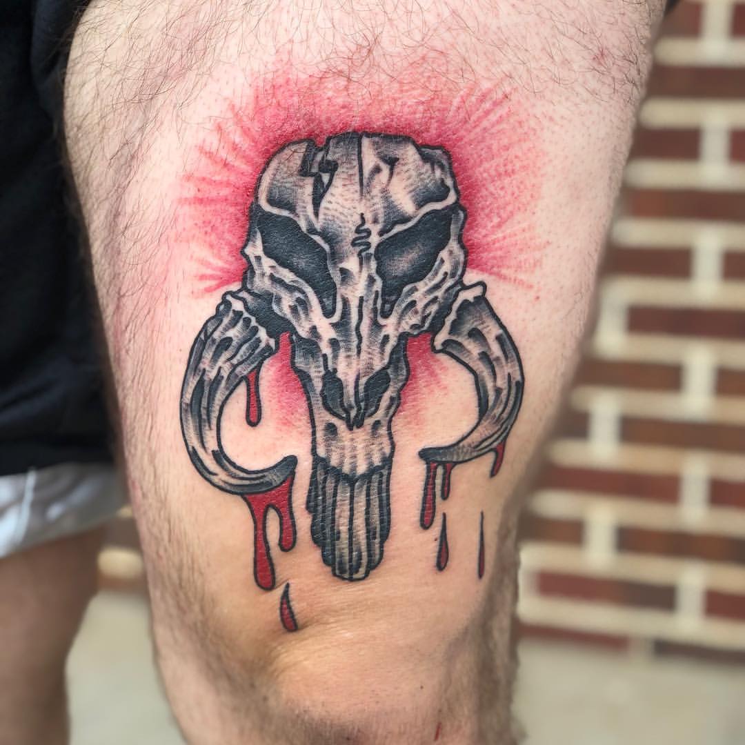 Mandalorian skull tattoo artwork on thigh